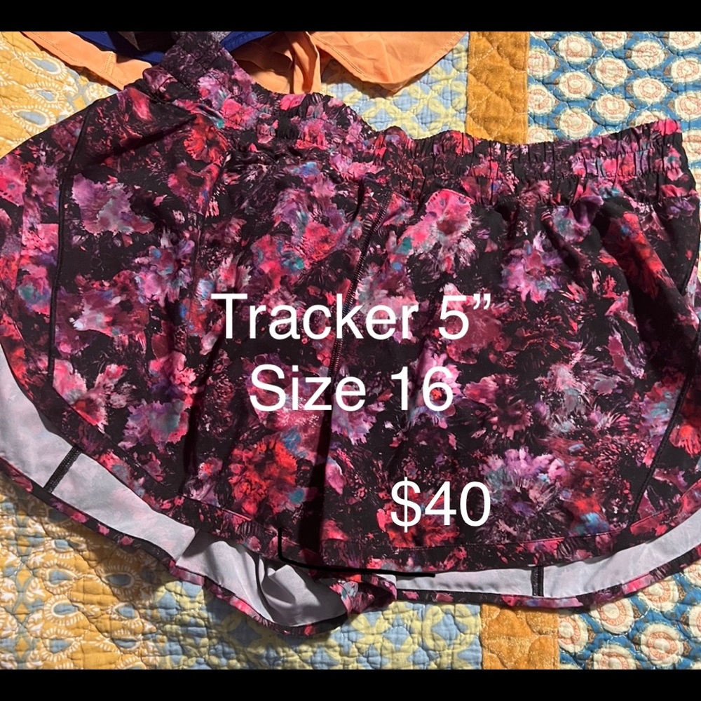 Lululemon tracker shorts, pink floral pattern. 5” inseam